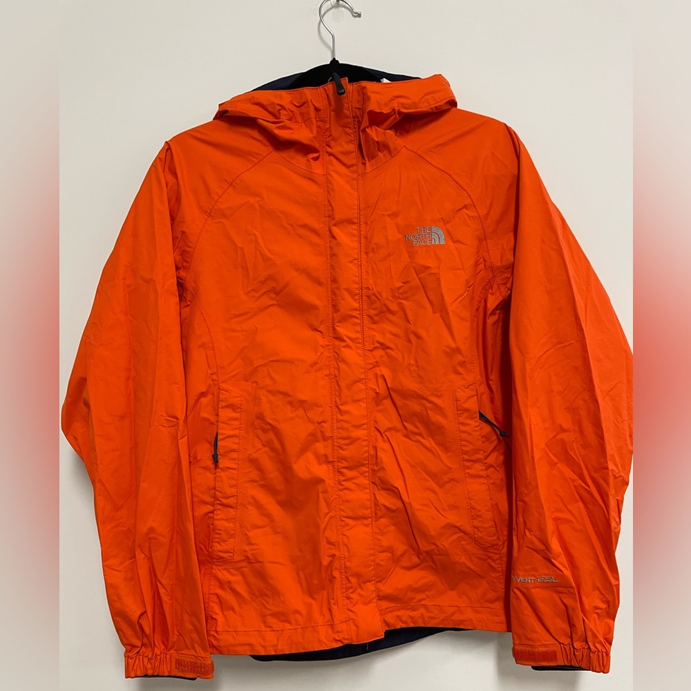 Orange North Face windbreaker women’s XS